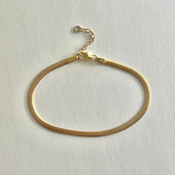 Bracciale a spina di pesce riempito d'oro