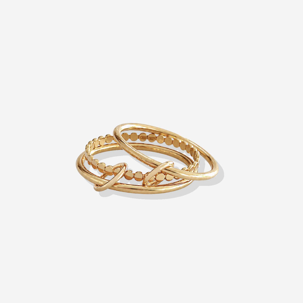 14K gold filled triple stacking ring with two smooth bands and one beaded band connected by a jump ring