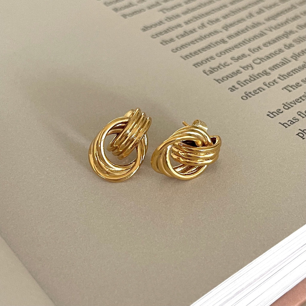 Close-up of gold knot hoop earrings – tarnish-resistant and hypoallergenic