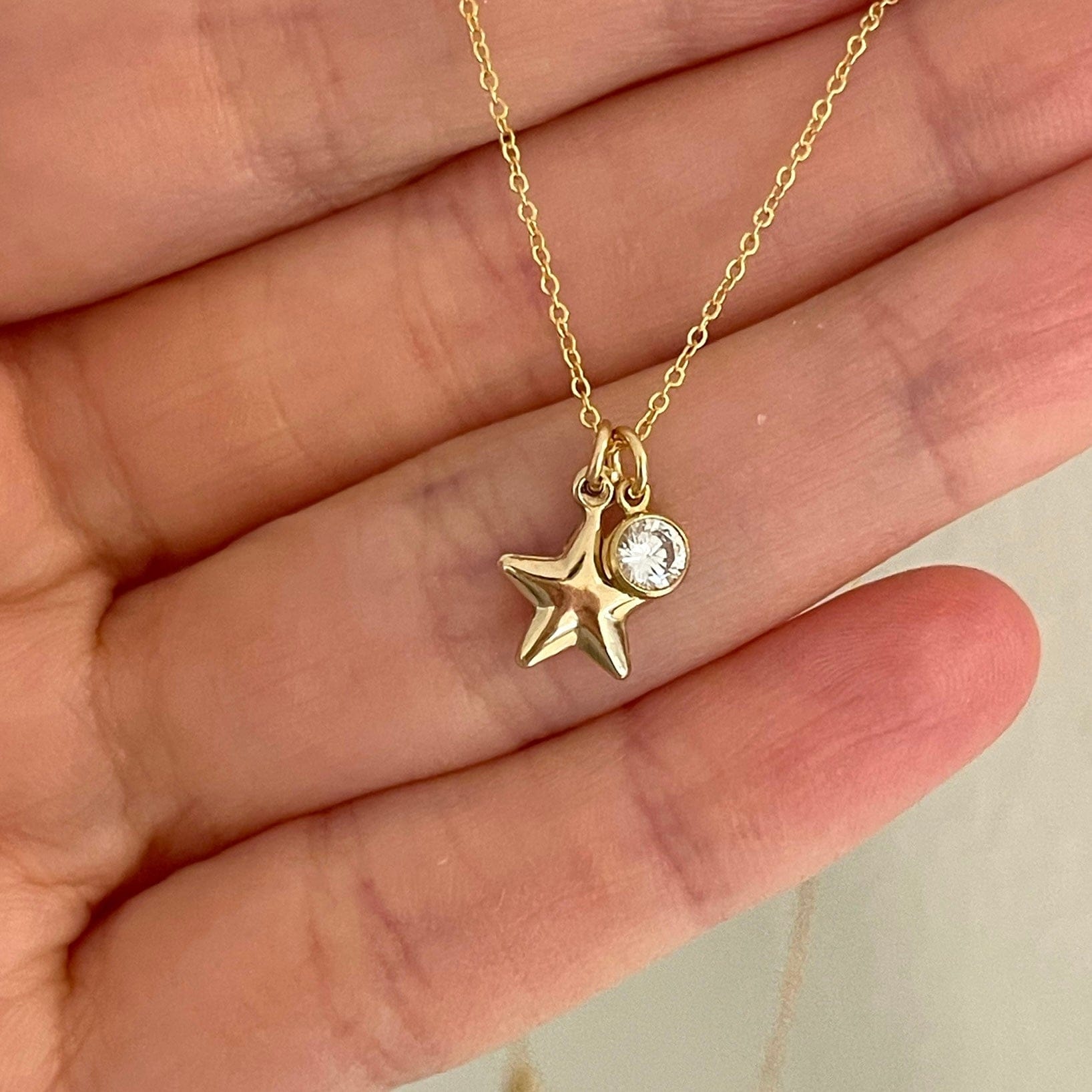 Handcrafted dainty gold necklace with heart star charm and 4mm CZ accent