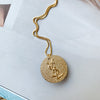 Collana con moneta d'oro di design vintage