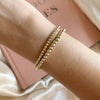 Set di braccialetti con perline riempiti d'oro